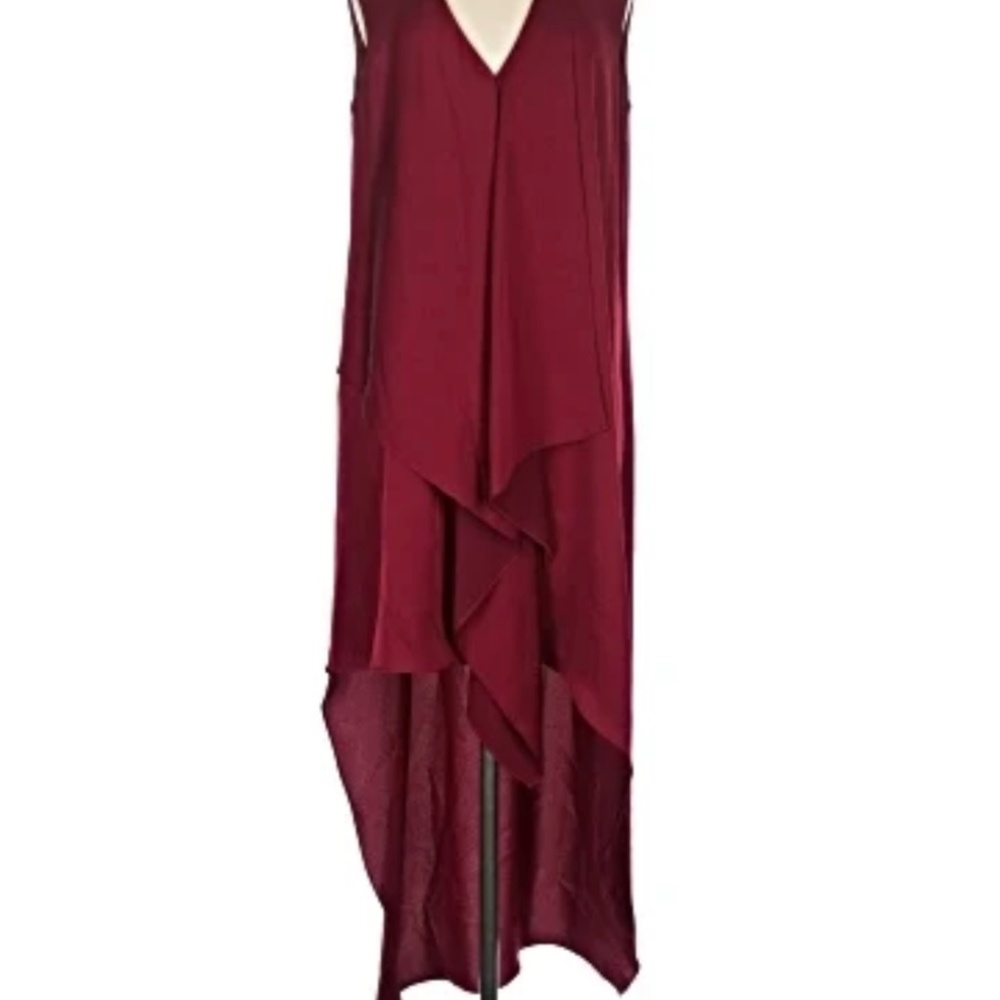 Never worn. BCBG Cherry red high low dress size small.